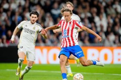 维尼修斯梅开二度助皇马10人逆转马竞 5连胜紧追西甲榜首